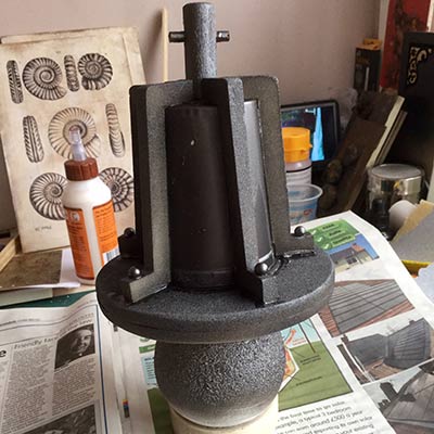 Grey spray primer giving a corroded look