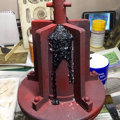 Leaked liquid effectusing acrylic medium embedded with coarse crystal salt