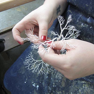 Brass etched tree armature being shaped