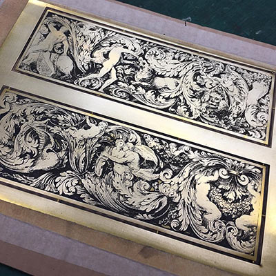 Laser in-filled etching