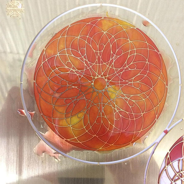 Photo etched brass inlaid with resin
