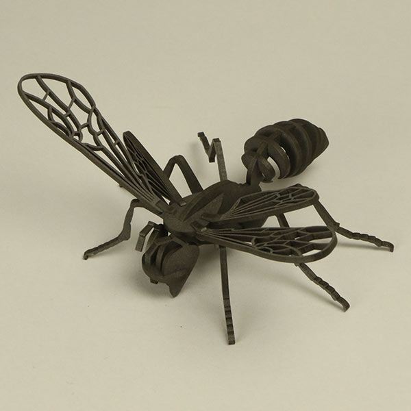 Laser cut wasp in FIBRANOR black MDF