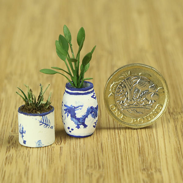 Miniature indoor plants and vase