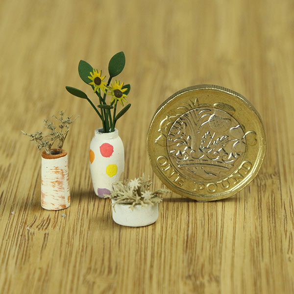 Miniature indoor plants and vase